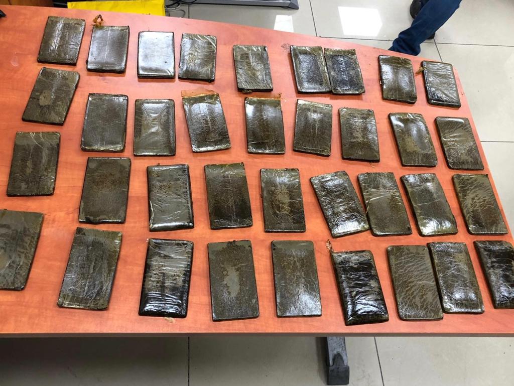 פלטות חשיש שנתפסו (צילומים: דוברות המשטרה)