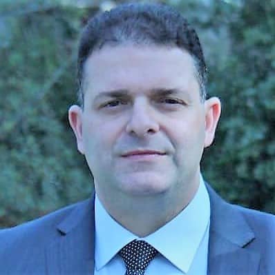 עו"ד מני אלביר