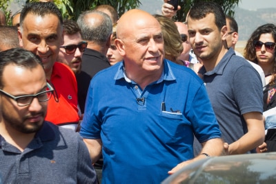 אם כבר, אז צריך לשייך אותו לפתח. באסל גטאס (במרכז) ביום כניסתו לכלא (צילום: באסל עווידאת, פלאש 90)