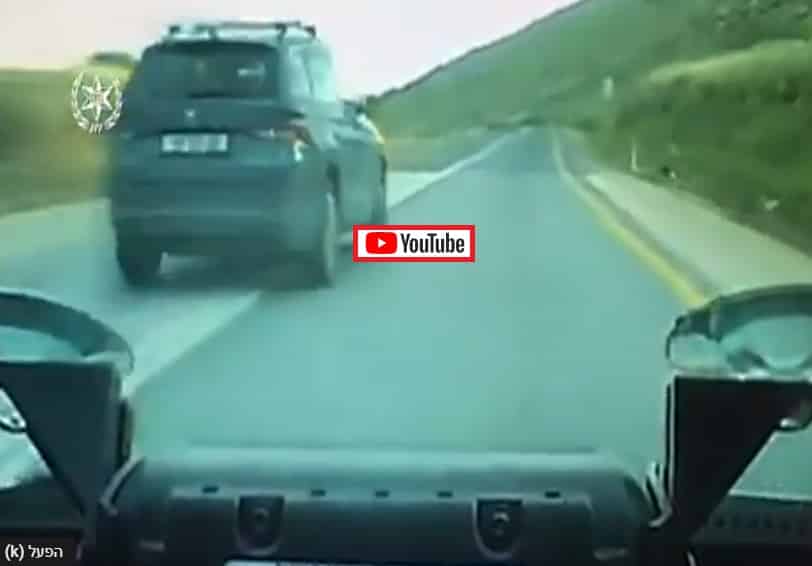 צפו בסרטון: עקיפה בקו הפרדה רציף של ניידת משטרה סמויה