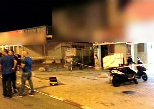 בלשי המשטרה בזירת הרצח. צילום: דוברות המשטרה