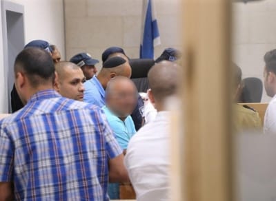 עד המדינה טולי (מטושטש) בשלב הארכות המעצר בפרשה. 