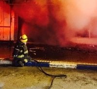 החשד: סחיטה באיומים ושלוש הצתות של סופרמרקט