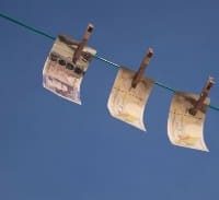 המשטרה: להעמיד לדין עשרות בלדרים ברשת הלבנת הון במגזר החרדי