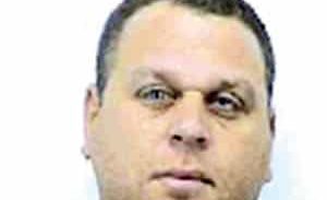 החשד: יוסי גנגינה החזיק אקדח באתר הבנייה של ביתו