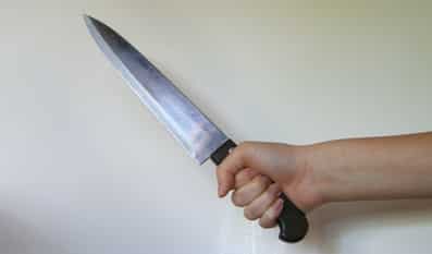 hand with knife
