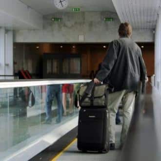 man with suitcase freepik