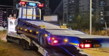 טירת כרמל: משאית של המשטרה גוררת משאית של גנבי מחפרון