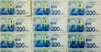 בתאגידים הפיננסים מציעים להגדיל את רווחיהם באמצעות ביטול שטרות ה-200?